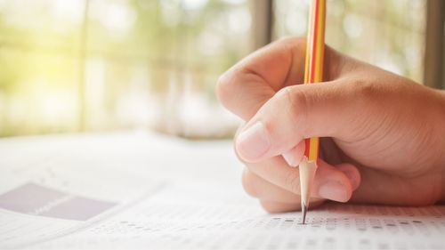 Filling a paper answer sheet